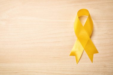 Açık renkli sarı şeritte. Kanser kavramı