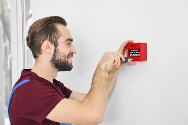 Electrician Installing Fire Alarm System — Stock Photo, Image