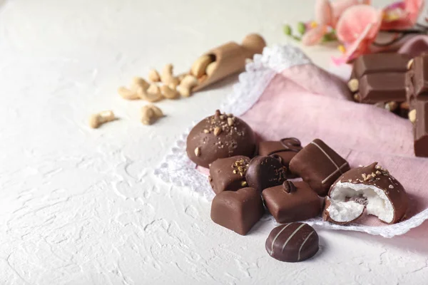 Yummy Chocolate Candies White Textured Background — Stock Photo, Image