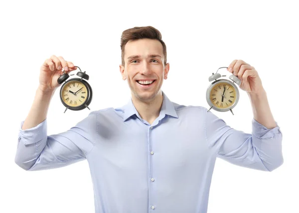 白い背景の上の目覚まし時計で成功した実業家 時間管理の概念 ストック画像