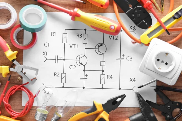 Electrician Supplies Circuit Diagram Wooden Background — Stock Photo, Image