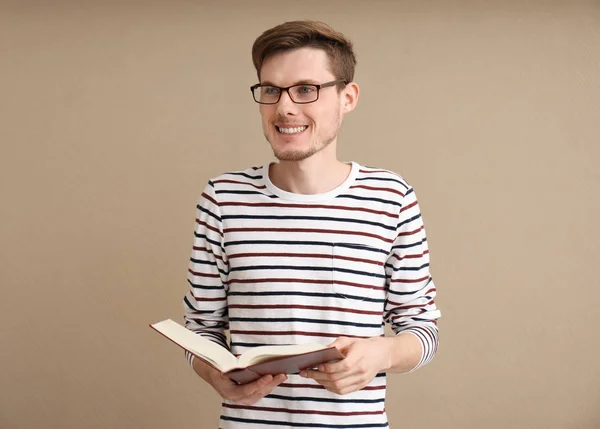 Young Man Book Color Background — Stock Photo, Image