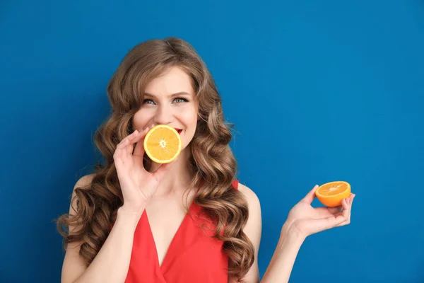 Beautiful Young Woman Halves Orange Color Background — Stock Photo, Image