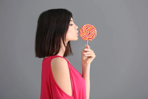 Beautiful Young Woman Lollipop Grey Background — Stock Photo, Image