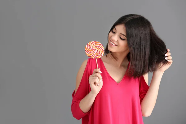 Beautiful Young Woman Lollipop Grey Background — Stock Photo, Image