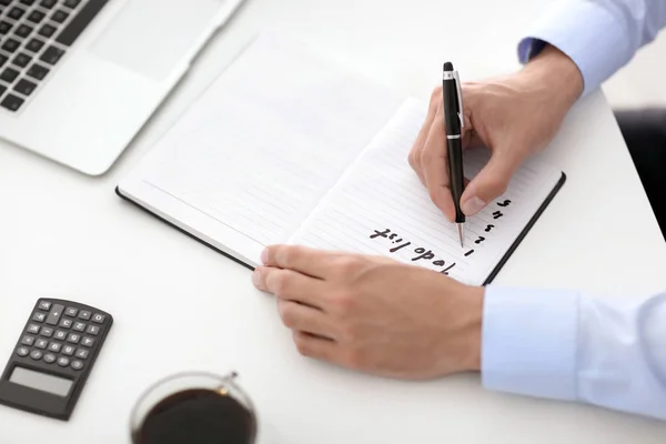 Businessman Writing List Table Office — Stock Photo, Image