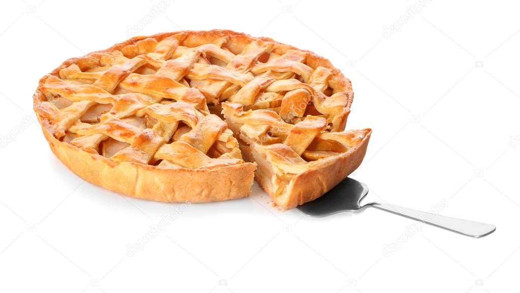 Tasty homemade apple pie and spatula on white background