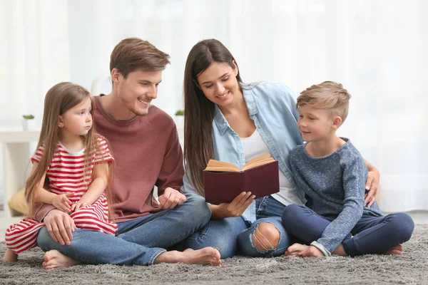 Happy Family Reading Book Together Home — Stock Photo, Image