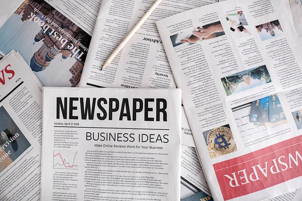 Many Newspapers Top View — Stock Photo, Image