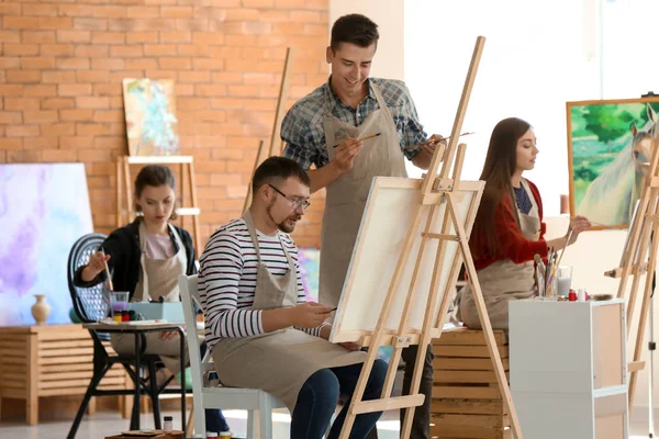 Male Teacher Helping His Student Classes School Painters — Stock Photo, Image