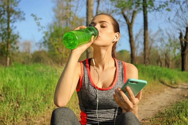 Sporty Young Woman Drinking Water Running Park — Stock Photo, Image