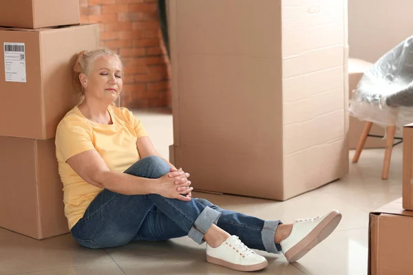 Mature Woman Moving Boxes Sitting Floor New Home — Stock Photo, Image