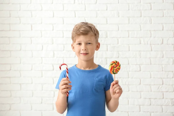 Cute Little Boy Lollipop Candy Cane White Brick Wall — Stock Photo, Image