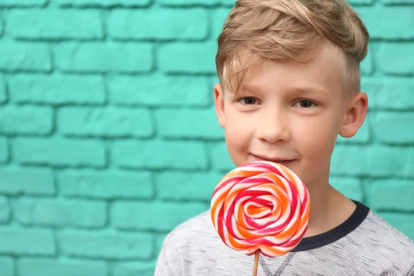 Cute Little Boy Lollipop Color Brick Wall — Stock Photo, Image