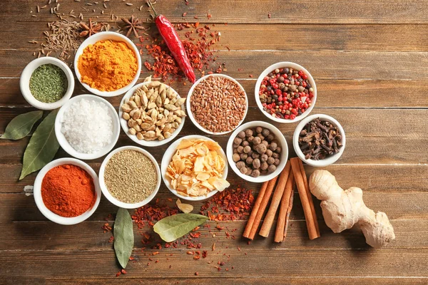 Bowls Various Spices Wooden Background — Stock Photo, Image