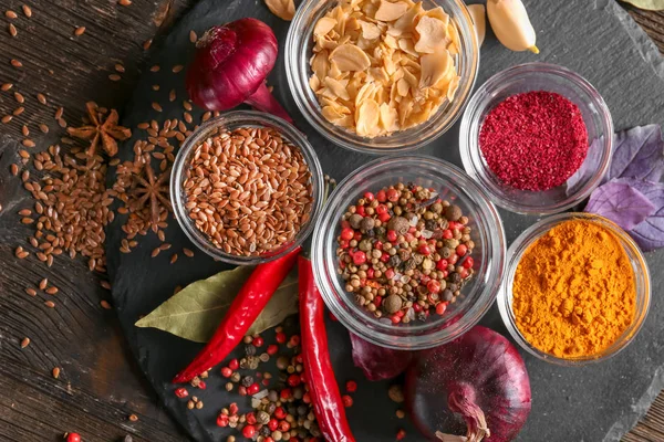 Slate Plate Various Spices Wooden Background — Stock Photo, Image