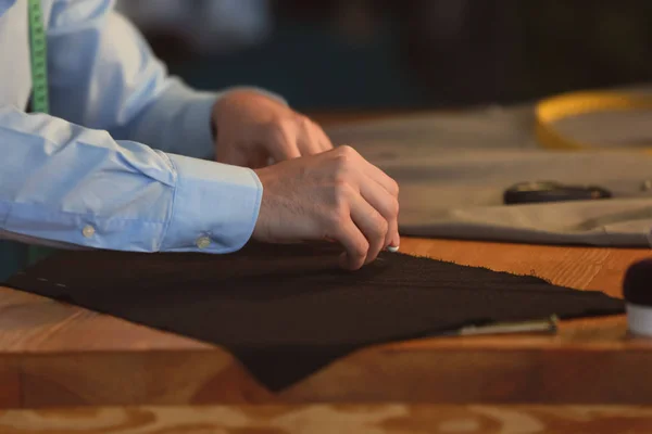 Young Tailor Marking Fabric Chalk Atelier — Stock Photo, Image