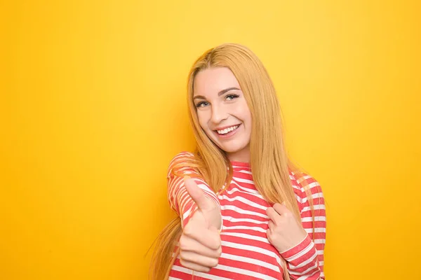Beautiful Young Woman Showing Thumb Gesture Color Background — Stock Photo, Image