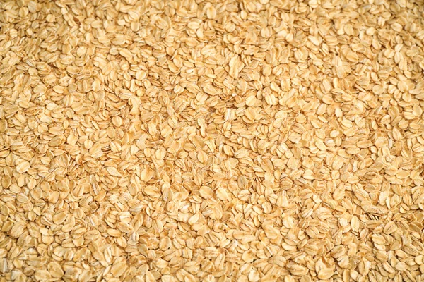 Raw Oatmeal Flakes Background — Stock Photo, Image