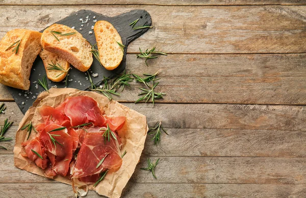 Sliced Prosciutto Rosemary Bread Wooden Table — Stock Photo, Image