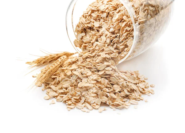 Overturned Glass Jar Raw Oatmeal White Background Closeup — Stock Photo, Image