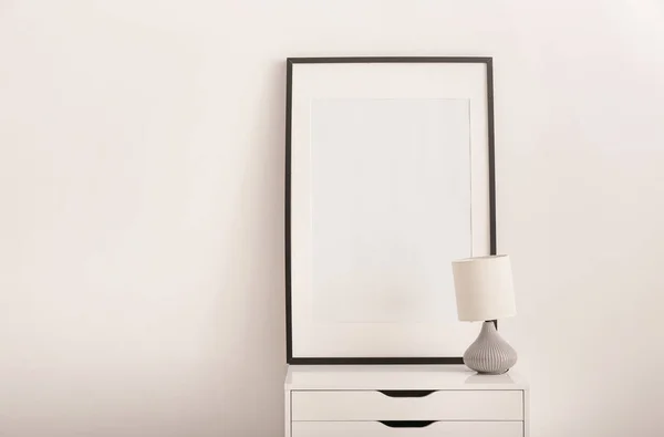 Blank Photo Frame Chest Drawers White Wall — Stock Photo, Image