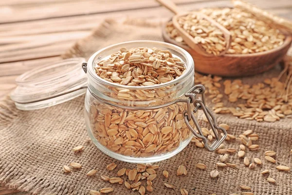 Vaso Vetro Con Fiocchi Avena Crudi Sul Tavolo Legno — Foto Stock