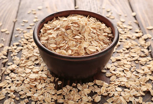 Bowl Raw Oatmeal Flakes Wooden Table — Stock Photo, Image