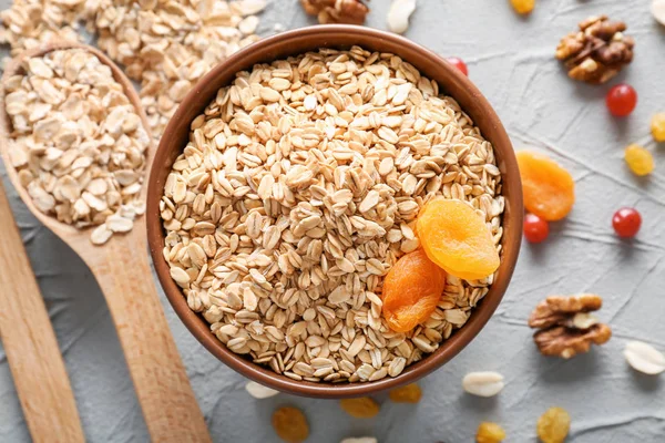 Bowl Oatmeal Flakes Textured Background — Stock Photo, Image