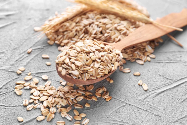 Spoon Raw Oatmeal Light Textured Background — Stock Photo, Image