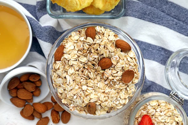 Bowl Raw Oatmeal Nuts Table — Stock Photo, Image