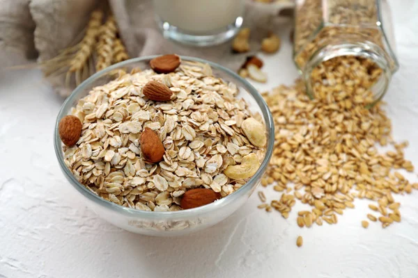 Bowl Raw Oatmeal Nuts Table — Stock Photo, Image