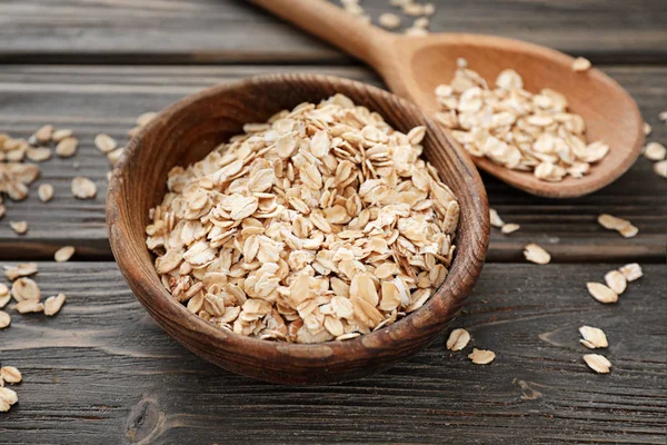 Cuenco Cuchara Con Avena Cruda Sobre Fondo Madera — Foto de Stock