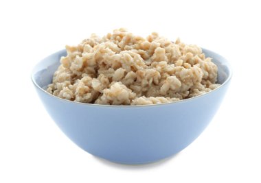 Beyaz zemin üzerine hazırlanan yulaf ezmesi ile kase