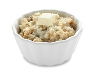 Beyaz zemin üzerine hazırlanan yulaf ezmesi ile kase