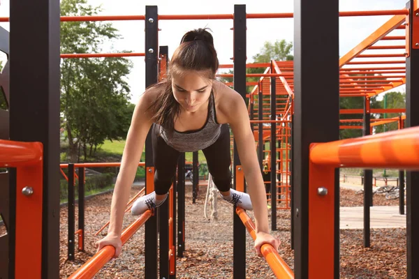 Sporty Young Woman Training Athletic Field — Stock Photo, Image