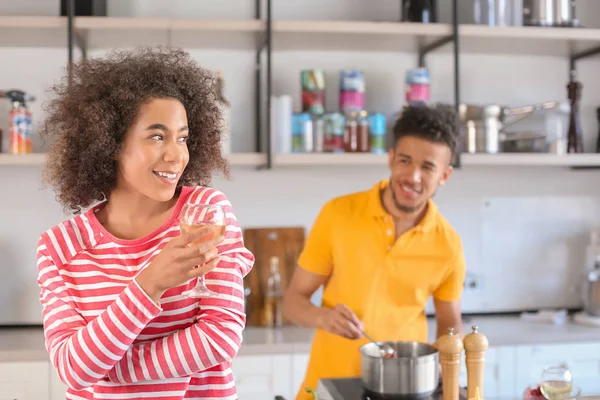 Young African American Woman Drinking Wine Her Boyfriend Cooking Kitchen — Stock Photo, Image