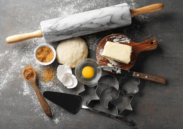 Utensils with ingredients for preparing bakery on table