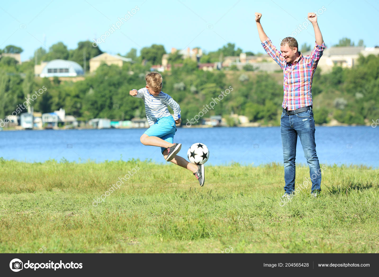 Happy Father Son Playing Football River Stock Photo by ©serezniy 204565428