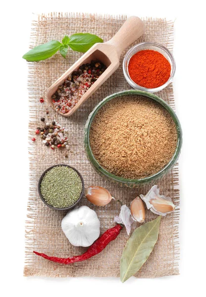 Composition with different spices on white background