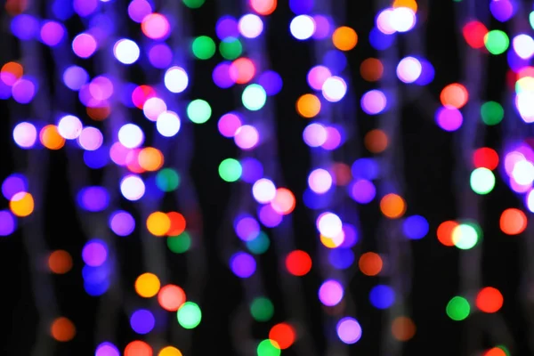 Rozmazané Vánoční Světla Tmavém Pozadí — Stock fotografie