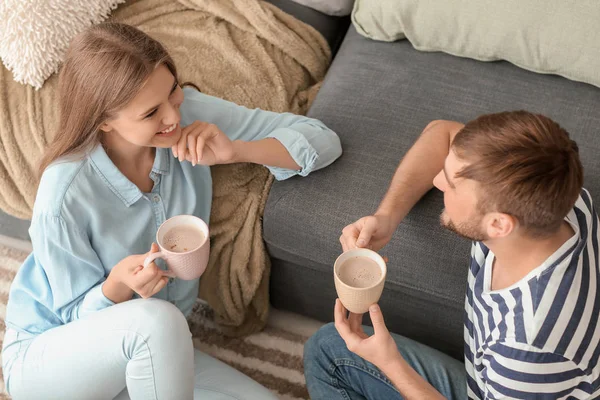 Happy Young Couple Drinking Hot Coffee While Resting Home — Stock Photo, Image