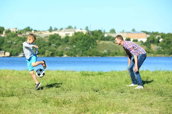 Happy Father Son Playing Football River — Stock Photo, Image