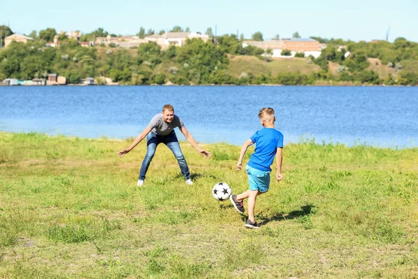 Happy Father Son Playing Football River — Stock Photo, Image