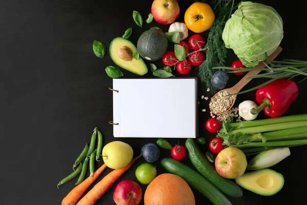 Various Healthy Products Notebook Dark Background — Stock Photo, Image