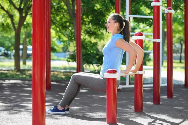 Sporty Young Woman Training Athletic Field Outdoors — Stock Photo, Image