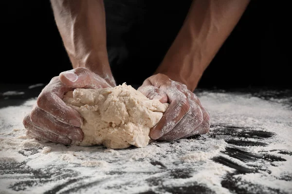 Man Kneading Dough Black Background — Stok Foto