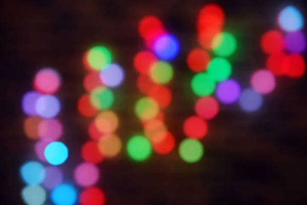 Karanlık Arka Planda Bulanık Noel Işıkları — Stok fotoğraf