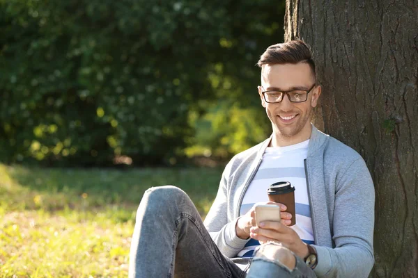 Handsome Man Mobile Phone Cup Coffee Resting Park — Stock Photo, Image
