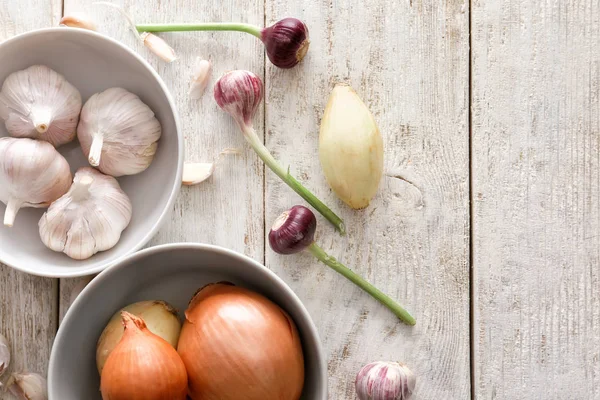 Different Fresh Garlic Onions Wooden Table — Stock Photo, Image